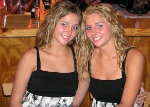 Twin sisters identity can be told by checking neck mole