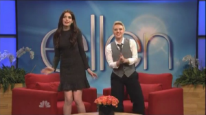 WATCH: Anne Hathaway Does Katie Holmes Impression in SNL “Ellen” Parody