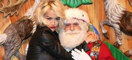 Naughty Rita Ora Sits on Santa’s Lap to Promote her Material Girl Holiday Collection