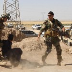 Personnel from Kurdish security forces detain man suspected of being a militant belonging to ISIL in outskirts of Kirkuk